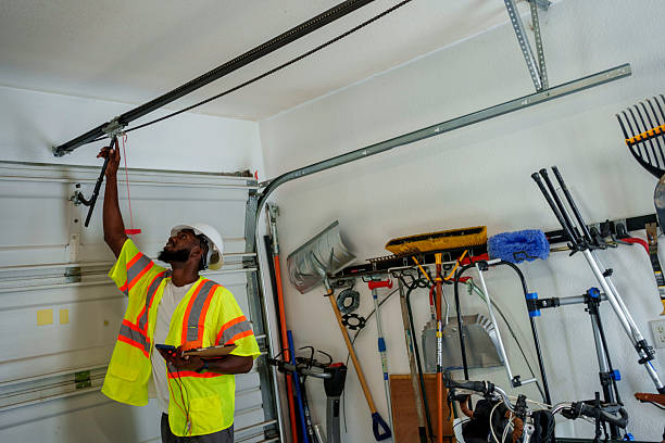 Professional Garage Door Roller Replacement technician working in Russell, KS